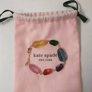 Kate Spade New York Treasure Trove bracelet and pink bag